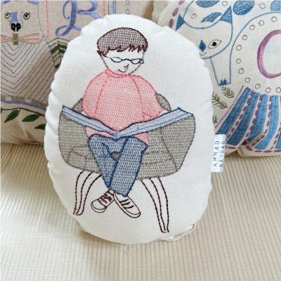 Reading Girl Embroidered Shaped Cushion Reading Girl Embroidered Shaped Cushion