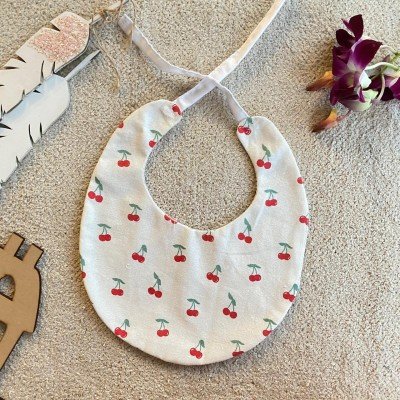 Cherry printed bib Cherry printed bib