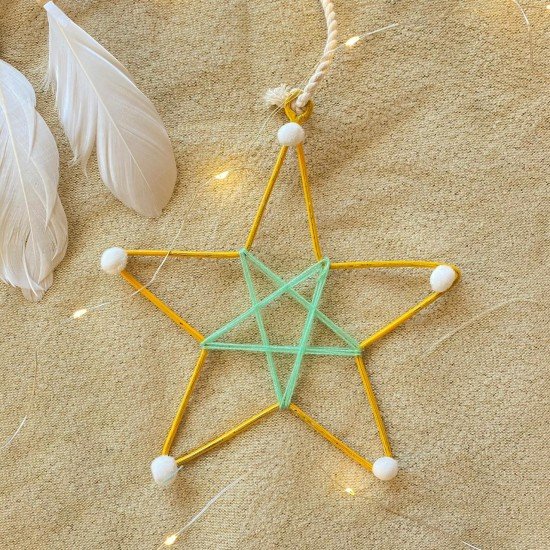 Yellow Metal Star With Pom Poms Yellow Metal Star With Pom Poms