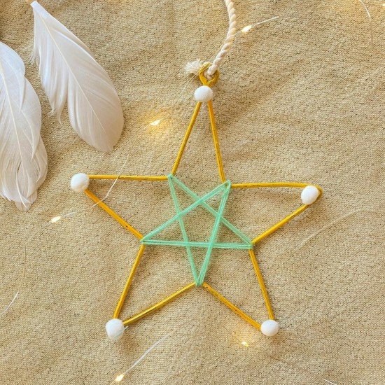 Yellow Metal Star With Pom Poms