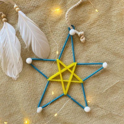Blue Metal Star With Pom Poms Blue Metal Star With Pom Poms