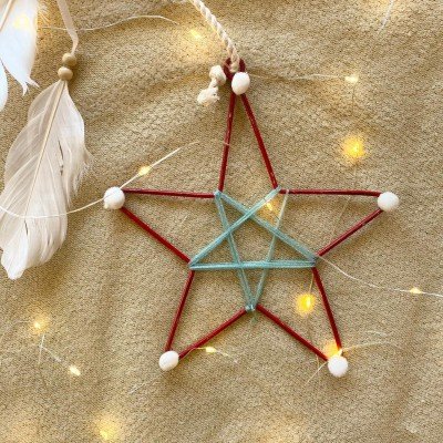 Red Metal Star With Pom Poms Red Metal Star With Pom Poms