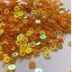 Orange coloured sequins