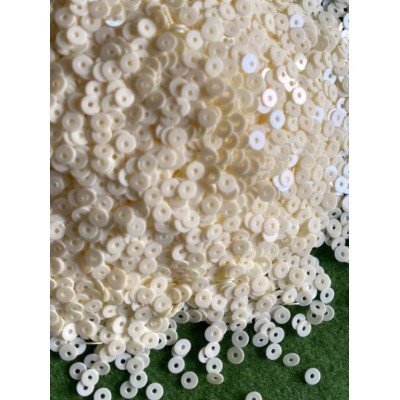 White coloured sequins White coloured sequins