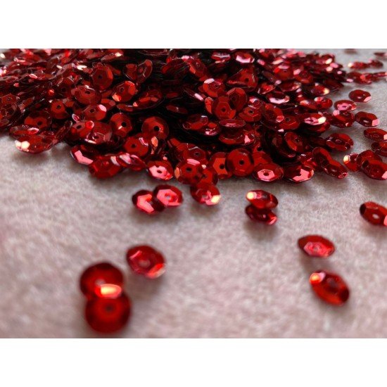 Red coloured sequins